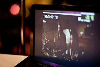 Hayden Christensen pictured on the monitor during film score recording.